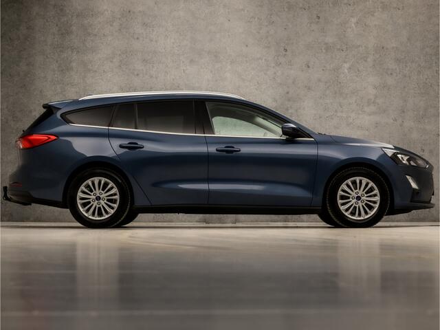 Ford FOCUS Wagon 1.0 EcoBoost Titanium X Business Automaat (VIRTUAL COCKPIT, APPLE CARPLAY, STUUR/STOELVERWARMING, ADAPTIVE CRUISE, SPORTSTOELEN, GETINT GLAS, CAMERA, TREKHAAK, NIEUWE APK, NIEUWSTAAT)