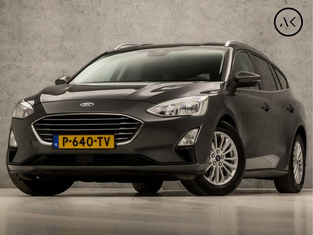 Ford FOCUS Wagon 1.0 EcoBoost Titanium (APPLE CARPLAY, GROOT NAVI, STUUR/STOELVERWARMING, ADAPTIVE CRUISE, SPORTSTOELEN, GETINT GLAS, CAMERA, LANE ASSIST, NIEUWSTAAT)