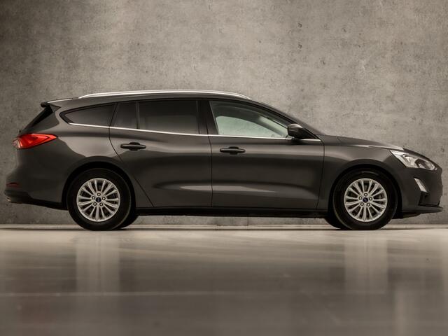Ford FOCUS Wagon 1.0 EcoBoost Titanium (APPLE CARPLAY, GROOT NAVI, STUUR/STOELVERWARMING, ADAPTIVE CRUISE, SPORTSTOELEN, GETINT GLAS, CAMERA, LANE ASSIST, NIEUWSTAAT)