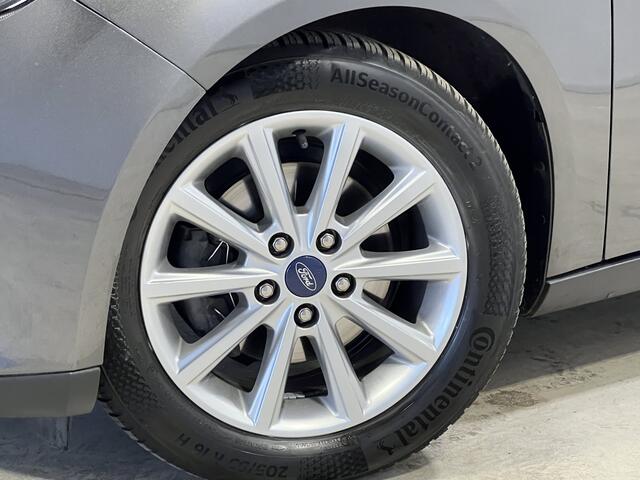 Ford FOCUS Wagon 1.0 Titanium | Navigatie/Android/Apple Carplay | LM Velgen 16" | Achteruitrijcamera + PDC Achter | Cruise Control | Airco | Verwarmde Voorruit |