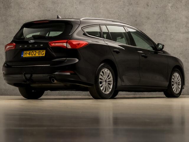 Ford FOCUS Wagon 1.0 EcoBoost Titanium Sport Automaat (APPLE CARPLAY, GROOT NAVI, CLIMATE, TREKHAAK, SPORTSTOELEN, KEYLESS, LED KOPLAMPEN, LM VELGEN, LANE ASSIST, NIEUWSTAAT)