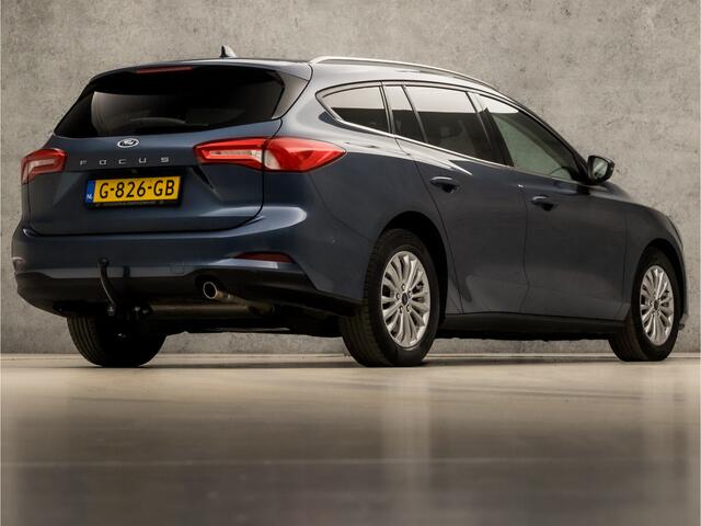 Ford FOCUS Wagon 1.0 EcoBoost Titanium Sport Automaat (APPLE CARPLAY, GROOT NAVI, CAMERA, CLIMATE, TREKHAAK, ADAPTIVE CRUISE, SPORTSTOELEN, GETINT GLAS, LM VELGEN, NIEUWSTAAT)