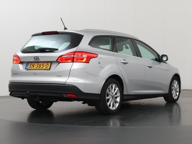 Ford FOCUS Wagon 1.0 Titanium | Trekhaak | Navigatie | Voorruitverwarming | Cruise Control | Climate Control Parkeersensoren |