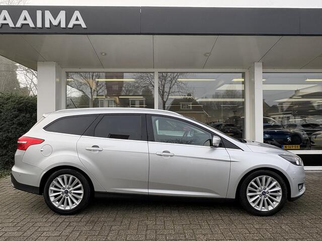 Ford FOCUS Wagon 1.0 Titanium | Stoel- & stuurverwarming | Achteruitrijcamera | Keyless | Navigatie | Trekhaak | Dodehoek detectie