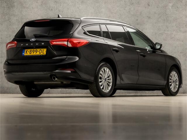 Ford FOCUS Wagon 1.0 EcoBoost Titanium X Automaat (VIRTUAL COCKPIT, APPLE CARPLAY, GROOT NAVI, STUUR/STOELVERWARMING, SPORTSTOELEN, ADAPTIVE CRUISE, KEYLESS, GETINT GLAS, CAMERA, NIEUWSTAAT)