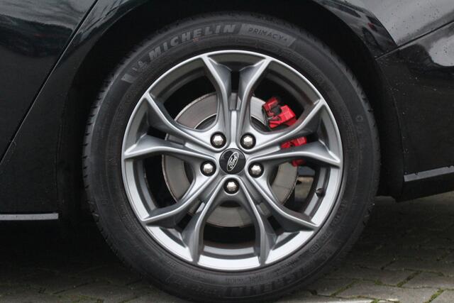 Ford FOCUS Wagon 1.0 EcoBoost Hybrid ST Line X Business | Incl. 12 maanden garantie | Trekhaak | Panorama dak | Achteruitrijcamera | Cruise control | Climate control | Airco | Bluetooth | Lichtmetalen velgen | Parkeersensoren