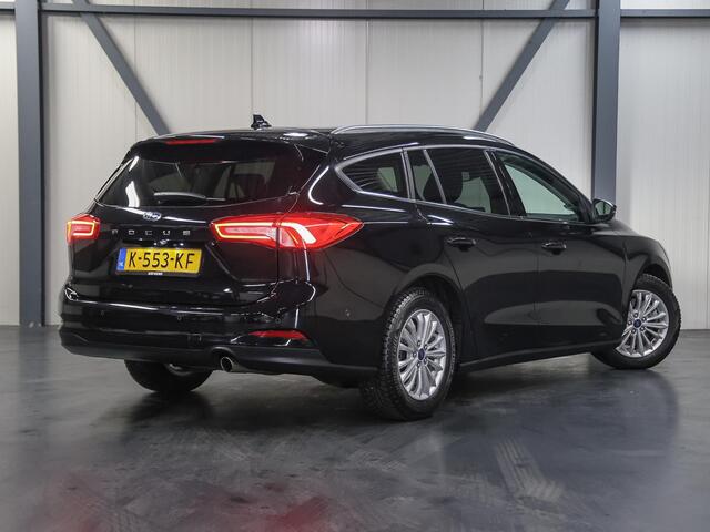 Ford FOCUS Wagon 120PK Titanium X | AppleCarplay/Android Auto | Winterpack | B&O Sound | Dodehoekdetectie | Camera | Electrische klep | Navigatie | Cruise Control | Parkeersensoren | Privacy Glass | Isofix |