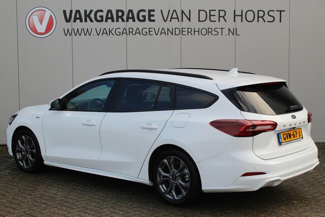 Ford FOCUS Wagon 1.0-125pk EcoBoost Mild-Hybrid ST-Line. In nieuwstaat ! Slechts 3.850km ! Autm. airco dual, camera, pdc v+a, adaptieve cruise cntrl, side- en lane assist, LED verlichting, stoel-, stuur- en voorraamverw., LM wielen, navigatie, telefoonvoorb. etc.