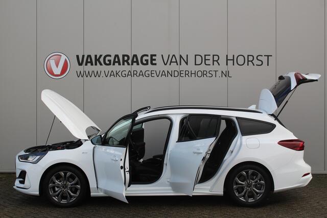 Ford FOCUS Wagon 1.0-125pk EcoBoost Mild-Hybrid ST-Line. In nieuwstaat ! Slechts 3.850km ! Autm. airco dual, camera, pdc v+a, adaptieve cruise cntrl, side- en lane assist, LED verlichting, stoel-, stuur- en voorraamverw., LM wielen, navigatie, telefoonvoorb. etc.