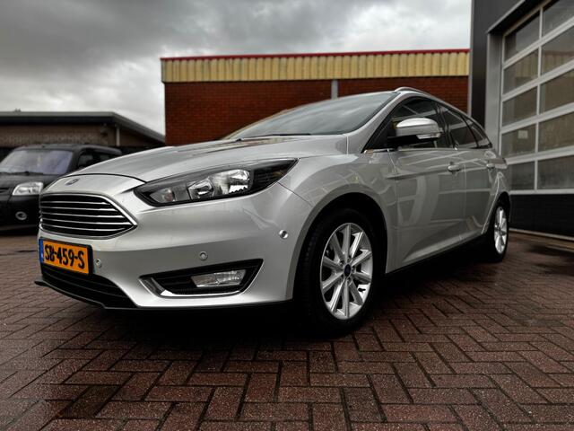 Ford FOCUS 1.0 TITANIUM / CAMERA / PDC / NAVI / CRUISE / LEER / STOEL-STUURVER.