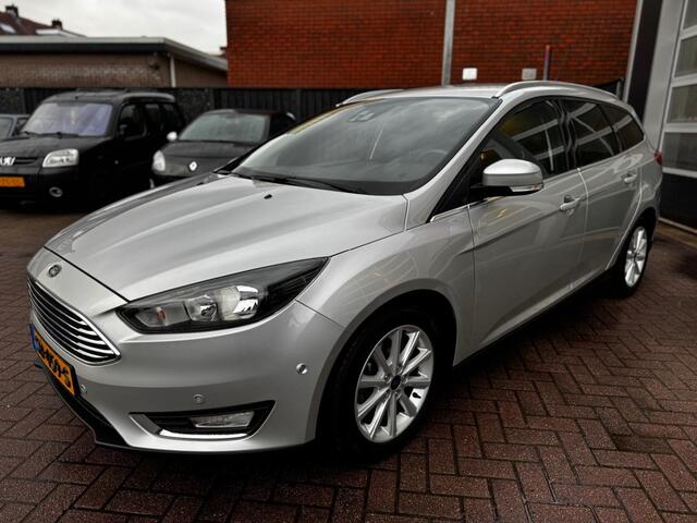 Ford FOCUS 1.0 TITANIUM / CAMERA / PDC / NAVI / CRUISE / LEER / STOEL-STUURVER.