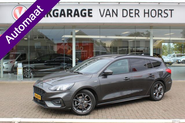 Ford FOCUS Wagon 1.0-125pk EcoBoost ST-Line AUTOMAAT ! Heel erg nette en goed onderhouden Ford Focus ST-Line wagon automaat. Volautm. airco dual, stoel-, stuur- en voorraamverw., camera, trekhaak, navigatie, telefoonvoorb., LM wln, cruise cntrl, skiluik etc., etc...