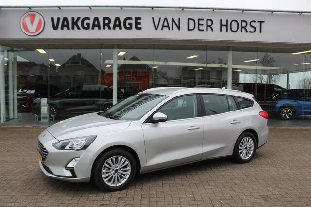 Ford FOCUS Wagon 1.0-125pk EcoBoost Mild-hybrid Titanium. Mooie, ruime, luxe en comfortabele Ford Focus wagon. Volautm. airco dual, camera, easy entry/easy go, stoel-, stuur- en voorraamverw., cruise control, Isofix, side- en lane assist, parkeersensoren v+a, LM wie