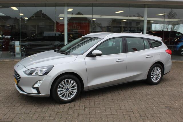 Ford FOCUS Wagon 1.0-125pk EcoBoost Mild-hybrid Titanium. Mooie, ruime, luxe en comfortabele Ford Focus wagon. Volautm. airco dual, camera, easy entry/easy go, stoel-, stuur- en voorraamverw., cruise control, Isofix, side- en lane assist, parkeersensoren v+a, LM wie