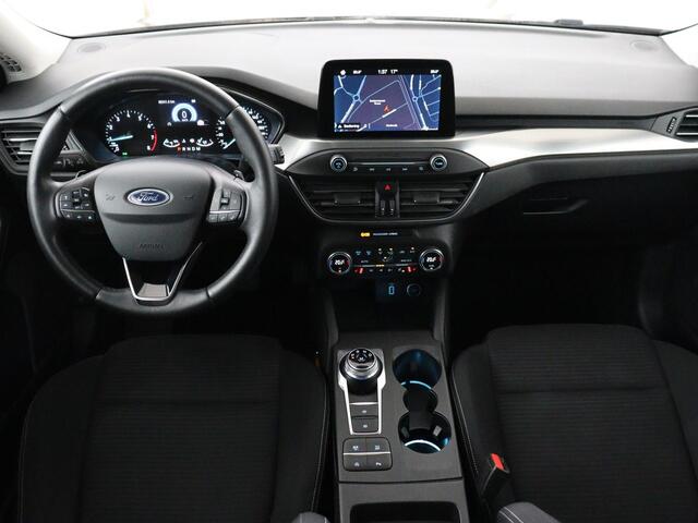Ford FOCUS 1.0 EcoBoost Titanium | Stoelverwarming | Trekhaak | Adaptive cruise | Carplay | Keyless | Navigatie | Parkeerhulp | Stuurverwarming | Climate control | Getint glas