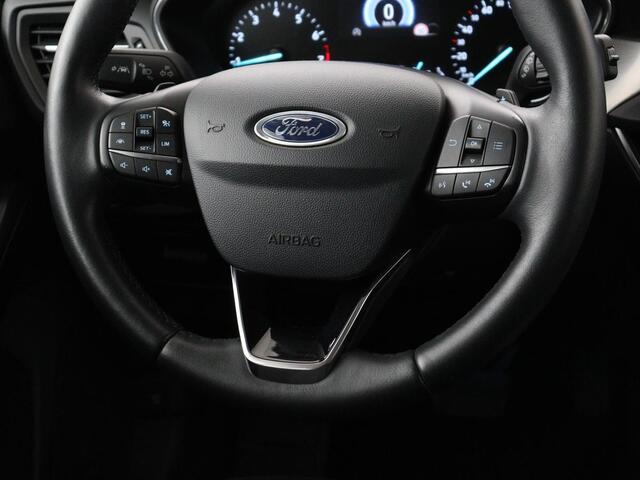 Ford FOCUS 1.0 EcoBoost Titanium | Stoelverwarming | Trekhaak | Adaptive cruise | Carplay | Keyless | Navigatie | Parkeerhulp | Stuurverwarming | Climate control | Getint glas