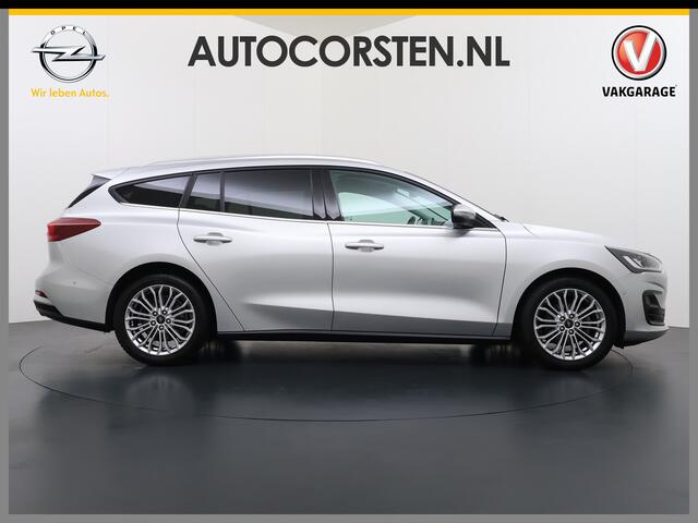 Ford FOCUS Wagon T 125PK Hybride Trekhaak Navi Camera LED Dual-ECC Keyless FordPass-ConnectStoel+Stuur+Voorruitverwarming Apple Carplay Android Auto Cruise Control Pdc Titanium Style DAB Bluetooth Lmv 17" Ecc GSM Draadloos Opladen Led Privacy Glas Isofix Lane Assist