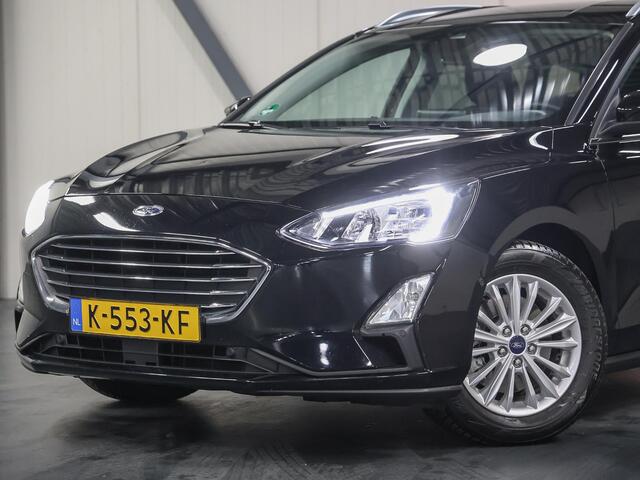 Ford FOCUS Wagon 120PK Titanium X | AppleCarplay/Android Auto | Winterpack | B&O Sound | Dodehoekdetectie | Camera | Electrische klep | Navigatie | Cruise Control | Parkeersensoren | Privacy Glass | Isofix |