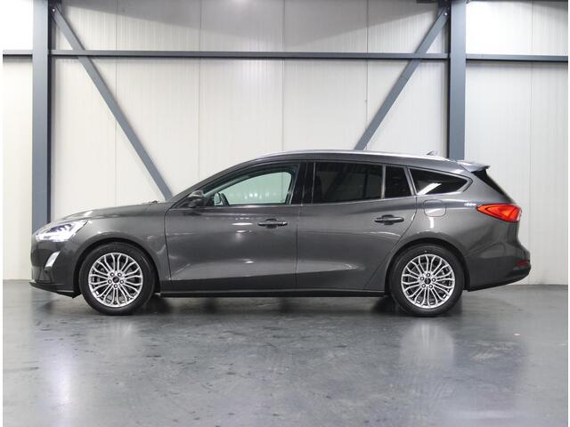 Ford FOCUS Wagon 125PK Titanium | 1ste eigenaar | AppleCarPlay/AndroidAuto | Winterpack | Stoel/Stuur/Voorruitverwarmd | Adaptief Cruise Control | Keyless | LED lampen | 17"LMV | Isofix | Privacy Glass | Parkeersensoren | Navigatie |