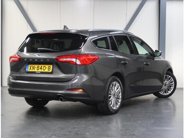 Ford FOCUS Wagon 125PK Titanium | 1ste eigenaar | AppleCarPlay/AndroidAuto | Winterpack | Stoel/Stuur/Voorruitverwarmd | Adaptief Cruise Control | Keyless | LED lampen | 17"LMV | Isofix | Privacy Glass | Parkeersensoren | Navigatie |