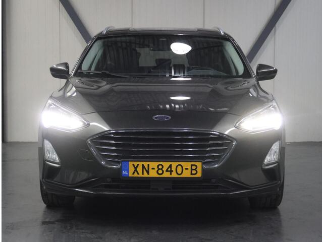 Ford FOCUS Wagon 125PK Titanium | 1ste eigenaar | AppleCarPlay/AndroidAuto | Winterpack | Stoel/Stuur/Voorruitverwarmd | Adaptief Cruise Control | Keyless | LED lampen | 17"LMV | Isofix | Privacy Glass | Parkeersensoren | Navigatie |