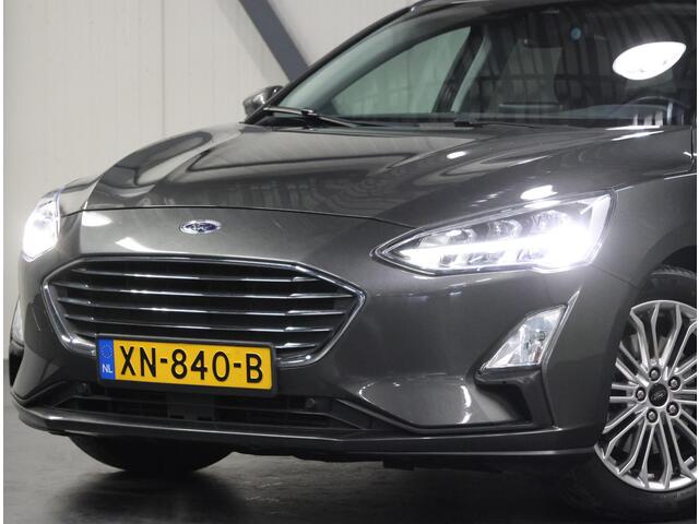 Ford FOCUS Wagon 125PK Titanium | 1ste eigenaar | AppleCarPlay/AndroidAuto | Winterpack | Stoel/Stuur/Voorruitverwarmd | Adaptief Cruise Control | Keyless | LED lampen | 17"LMV | Isofix | Privacy Glass | Parkeersensoren | Navigatie |