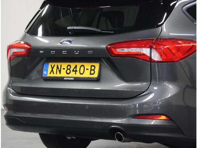 Ford FOCUS Wagon 125PK Titanium | 1ste eigenaar | AppleCarPlay/AndroidAuto | Winterpack | Stoel/Stuur/Voorruitverwarmd | Adaptief Cruise Control | Keyless | LED lampen | 17"LMV | Isofix | Privacy Glass | Parkeersensoren | Navigatie |