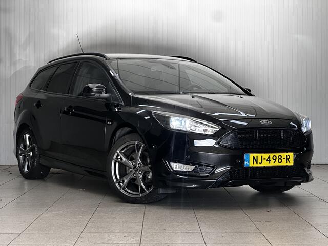 Ford FOCUS Wagon 1.0 ST-Line!/ Trekhaak/ 17'' LMV/ Apple + Android/ Navi/ Clima/ Cruise/ Elek. pakket/ Isofix/ Bluetooth/ Armsteun/ Multi. LEDER. Stuur/ Mistl./ PDC V+A/ Extra getint glas.