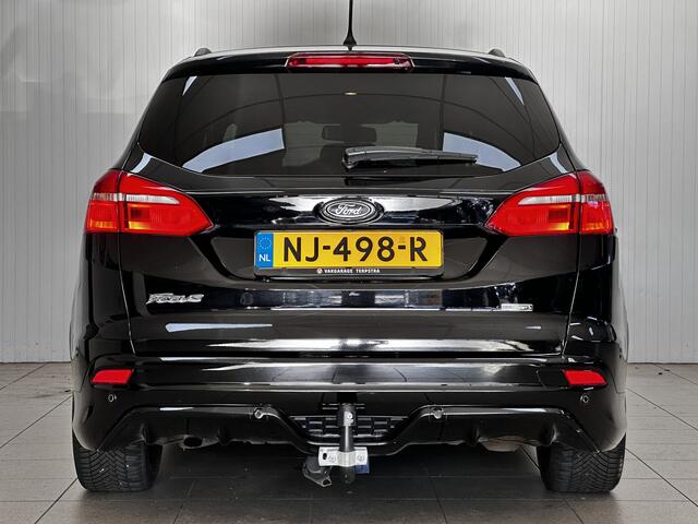 Ford FOCUS Wagon 1.0 ST-Line!/ Trekhaak/ 17'' LMV/ Apple + Android/ Navi/ Clima/ Cruise/ Elek. pakket/ Isofix/ Bluetooth/ Armsteun/ Multi. LEDER. Stuur/ Mistl./ PDC V+A/ Extra getint glas.