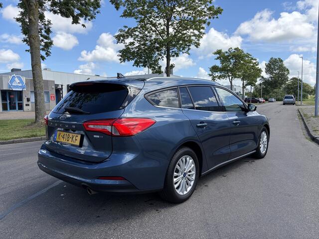 Ford FOCUS Wagon 1.0i EcoBoost Hybrid Titanium X Business 6-Bak 125 PK. Nieuwe auto en zeer zuinig !!! Open panoramadak !! Zeker een kansje deze auto !
