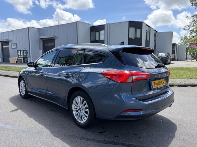 Ford FOCUS Wagon 1.0i EcoBoost Hybrid Titanium X Business 6-Bak 125 PK. Nieuwe auto en zeer zuinig !!! Open panoramadak !! Zeker een kansje deze auto !