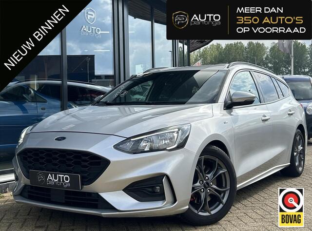 Ford FOCUS Wagon 1.5 EcoBoost ST Line Business 182PK | Volledig Dealeronderhouden | 2e Eigenaar | NL AUTO | NAP | Wegklapbare Trekhaak | Elektrische Stoel | Half Leder | Stoelverwarming | Stuurverwarming | Voorruitverwarming | Navigatie |