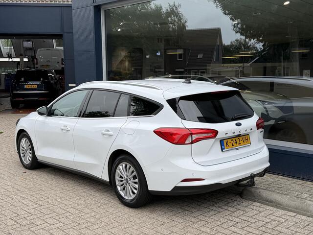 Ford FOCUS Wagon 1.0 EcoBoost Hybrid 155 PK Titanium X Business | Wegklapbare Trekhaak | Electrische Kofferklep | | Stuur & Stoelverwarming | Navigatie | Apple Carplay | Keyless entry | Lichtmetaal | Parkeersensoren | Cruise Control | Climatie Control | Camera