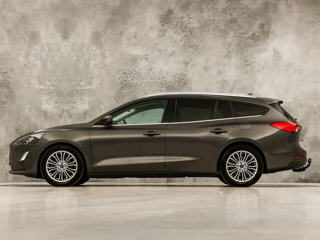 Ford FOCUS Wagon 1.0 EcoBoost Titanium Sport (APPLE CARPLAY, GROOT NAVI, STUUR/STOELVERWARMING, CAMERA, SPORTSTOELEN, GETINT GLAS, ADAPTIVE CRUISE, NIEUWSTAAT)