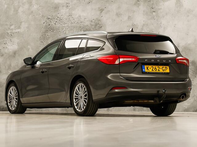 Ford FOCUS Wagon 1.0 EcoBoost Titanium Sport (APPLE CARPLAY, GROOT NAVI, STUUR/STOELVERWARMING, CAMERA, SPORTSTOELEN, GETINT GLAS, ADAPTIVE CRUISE, NIEUWSTAAT)