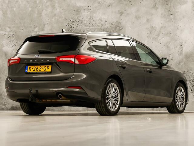 Ford FOCUS Wagon 1.0 EcoBoost Titanium Sport (APPLE CARPLAY, GROOT NAVI, STUUR/STOELVERWARMING, CAMERA, SPORTSTOELEN, GETINT GLAS, ADAPTIVE CRUISE, NIEUWSTAAT)