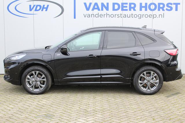 Ford KUGA 2.5-225pk PHEV ST-Line X. Let op ! Slechts 9.600km ! Volautm. airco dual, stoel- en voorraamverwarming, side- en lane assist, metallic lak, navigatie, telefoonvoorb., camera v+a, keyless entry/keyless go, elektr. achterklep, LM wielen, B&O soun