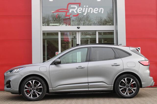 Ford KUGA 2.5 225PK PHEV ST-LINE | PANORAMISCH SCHUIF/KANTEL DAK | ELEKTRISCH BEDIENBARE ACHTERKLEP | FULL LED KOPLAMPEN | 360° CAMERA | KEYLESS ENTRY/START | CLIMATE CONTROL | ADAPTIVE CRUISE CONTROL | DAB+ RADIO | DRAADLOZE TELEFOONLADER | NAVIGATIE | APPLE CARPL