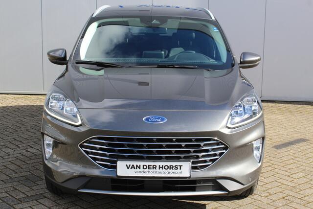 Ford KUGA 2.5-225pk PHEV Titanium X Plug-In Hybrid. Fabr. garantie t/m 07-04-2028 ! Slechts 10.000km ! Autm. airco dual, stoel-, stuur- en voorraamverw., LED verl., B&O soundsyst., metallic lak, cruise control, camera, LM wielen, elektr. achterklep en best. stoel e