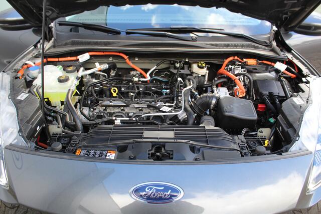 Ford KUGA 2.5-225pk PHEV Titanium X Plug-In Hybrid. Fabr. garantie t/m 07-04-2028 ! Slechts 10.000km ! Autm. airco dual, stoel-, stuur- en voorraamverw., LED verl., B&O soundsyst., metallic lak, cruise control, camera, LM wielen, elektr. achterklep en best. stoel e
