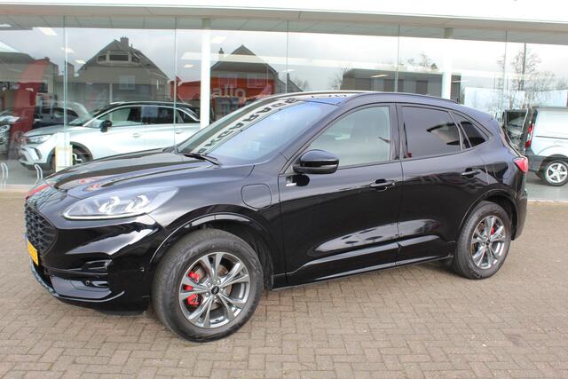 Ford KUGA 2.5-225pk PHEV ST-Line X Hybrid-AUTOMAAT ! Fabr. garantie t/m 11-03-2028 ! Slechts 16.000km ! Volautm. airco dual, stoel-, stuur- en voorraamverw., technologie-, styling- en bestuurders assistent pakket, elektr. trekhaak, camera v+a, HUD etc.