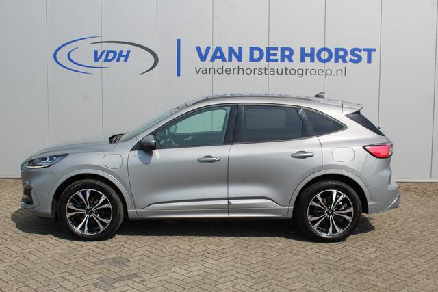 Ford KUGA 2.5-225pk PHEV ST-Line X. Hybride rijden voor een redelijke prijs ! Volautm. airco dual, Metallic lak, Stuur-, stoel-, achterbank- en voorraamverwarming, Side-en lane assist, Camera, pdc v+a, Adaptive Cruise Control, Elektr. achterklep etc, etc.