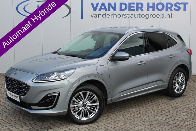 Ford KUGA 2.5-225pk PHEV Vignale. Heerlijke, luxe en comfortabele SUV ! Autm. airco dual, LM wielen, metallic lak, cruise control, lederen interieur, stoel-, stuur- en voorraamverw., elektr. achterklep, B&O soundsystem, navigatie, telefoonvoorb. etc, etc.