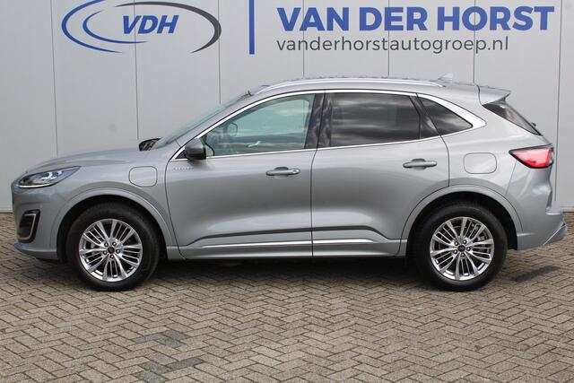 Ford KUGA 2.5-225pk PHEV Vignale. Heerlijke, luxe en comfortabele SUV ! Autm. airco dual, LM wielen, metallic lak, cruise control, lederen interieur, stoel-, stuur- en voorraamverw., elektr. achterklep, B&O soundsystem, navigatie, telefoonvoorb. etc, etc.