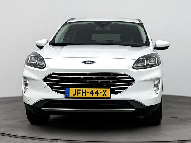Ford KUGA 2.5 PHEV Titanium | Winterpack | Climate control | Apple carplay & Android auto | Navi | stoelverwarming | Stuurverwarming | Camera | Cruise Control |