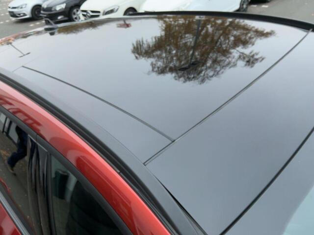 Ford KUGA 2.5 PHEV ST-Line X | Wegklapbare trekhaak | Panoramadak | Speciale kleur "Sedona Orange" | Winter Pack | Rode remklauwen