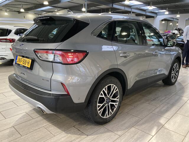 Ford KUGA 2.5 PHEV Titanium | 100% Dealer onderhouden | Winter Pack | Adapt. Cruise | HUD | Camera |
