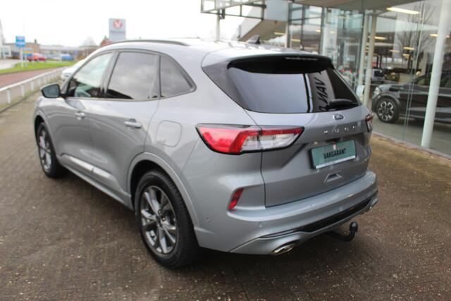 Ford KUGA 2.5-225pk PHEV ST-Line X. 1500kg Trekgewicht Hybride rijden voor een reëel bedrag ! Autm. airco dual, stuur-, stoel-, achterbank- en voorraamverw., keyless entry/keyless go, privacy glass, camera v+a, side- en lane assist, adaptieve cruise cntrl, trekhaak