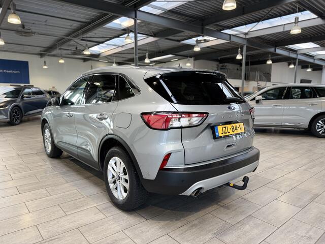 Ford KUGA 2.5 PHEV 225 pk Titanium | Trekhaak | Winter Pack | Adapt. cruise | Camera | El. a. klep | 100% dealer onderh.