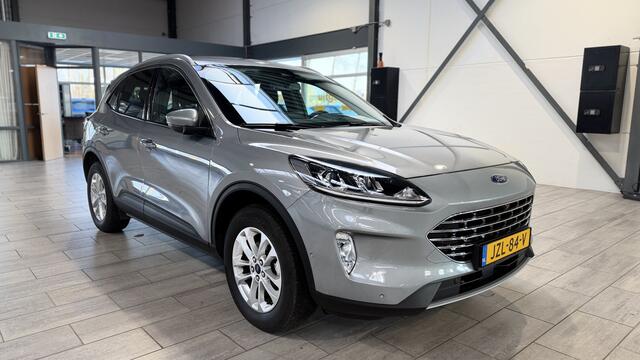 Ford KUGA 2.5 PHEV 225 pk Titanium | Trekhaak | Winter Pack | Adapt. cruise | Camera | El. a. klep | 100% dealer onderh.